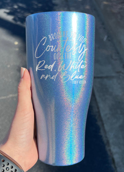 Courtesy Of The Red, White, And Blue Cursive Laser Etched Tumbler