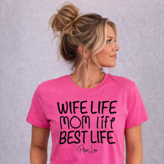 Woman wearing a pink t-shirt with text on a gray background
