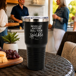 Never Let Anyone Dull Your Sparkle 30oz Engraved Tundra Tumbler — lifestyle