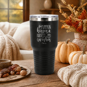 White 30oz engraved Tundra tumbler engraved with “Pumpkin Kisses & Harvest Wishes” in a apple-orchard harvest table lifestyle